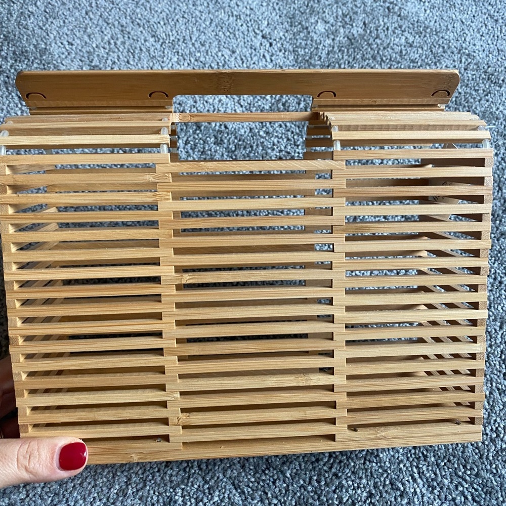 wood framed purse, perfect for a beach trip